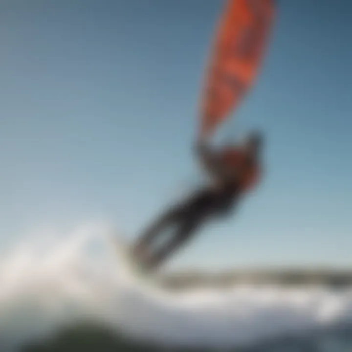 Kitesurfer performing a flip maneuver in the air