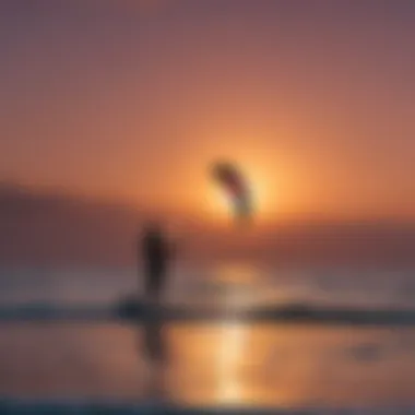 Artistic silhouette of a kitesurfer wearing a Gildan crop top against a colorful sunset sky