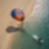 Aerial view of a kitesurfer inflating the kite