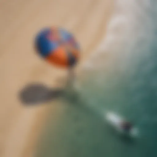 Aerial view of a kitesurfer inflating the kite