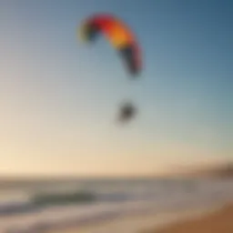 A vibrant kite soaring high in the sky during a kitesurfing session at the beach