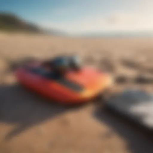 Kitesurfing gear laid out on the beach