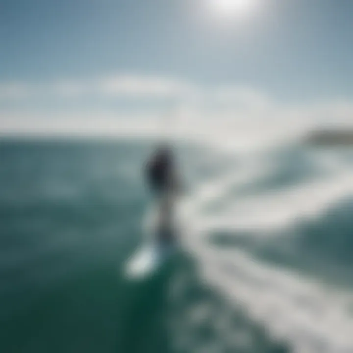 Aerial view of hydrofoil kitesurfing action on the open sea