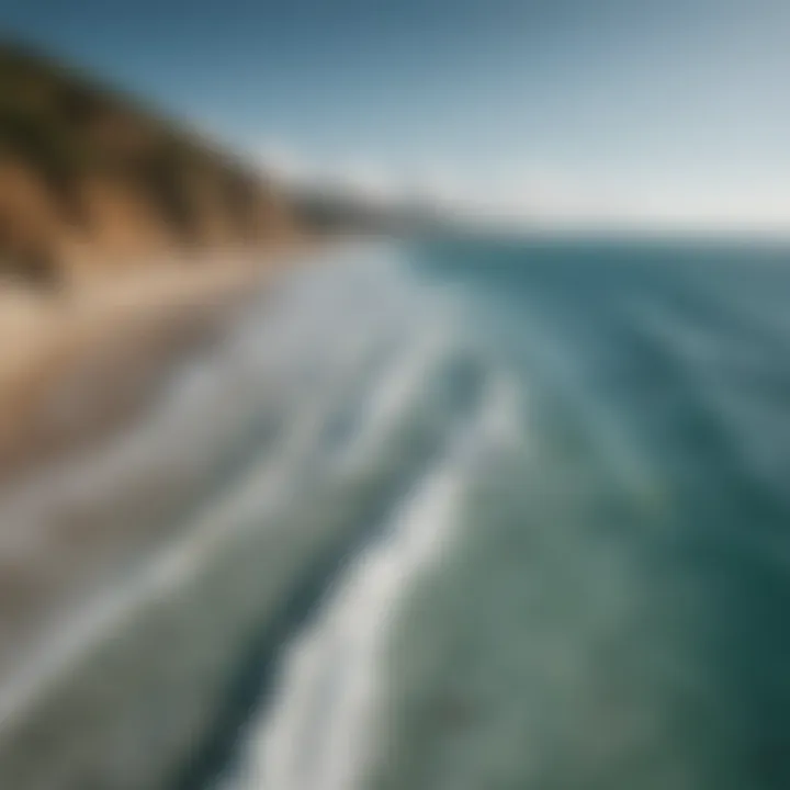 Aerial view capturing the dynamic movements of kiteboarders creating mesmerizing patterns in the ocean