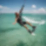 Kiteboarder performing an impressive aerial trick over the crystal-clear waters of Key West