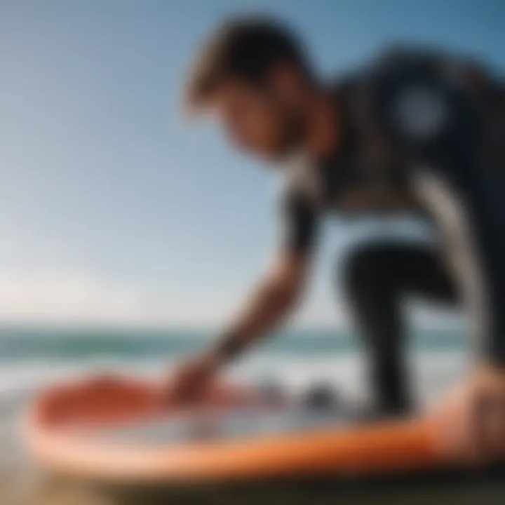 A kitesurfer performing maintenance on their gear