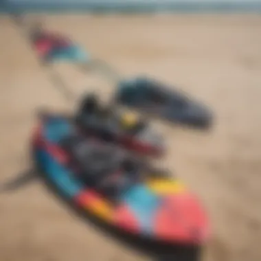 Colorful kite surfing equipment laid out on sandy beach in Michigan