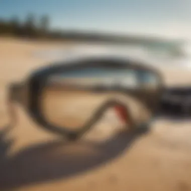 Close-up of kite surfing glasses on the beach