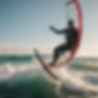 Kite surfer navigating ocean waves with vibrant kite