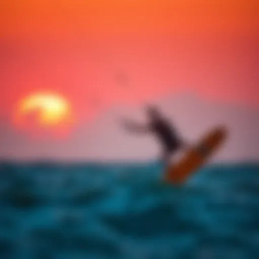 Kite surfing at sunset over the Atlantic Ocean