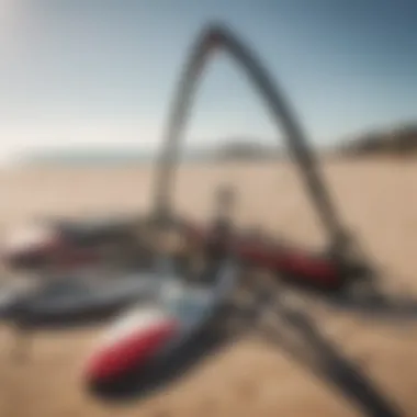 Kite surfing equipment lined up on the sandy beach