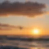 A vibrant kitesurfing scene at sunset over the water