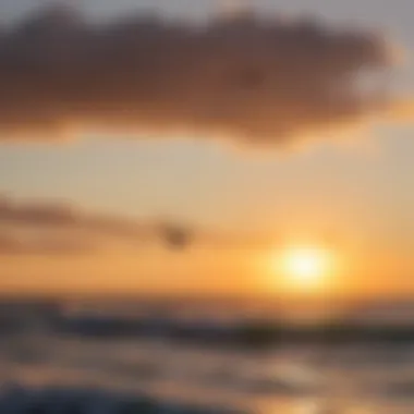 A vibrant kitesurfing scene at sunset over the water