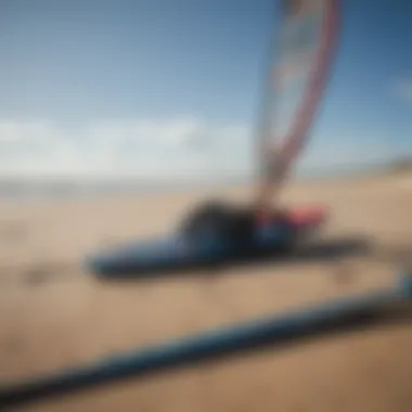 A collection of kite surfing equipment showcased on the beach