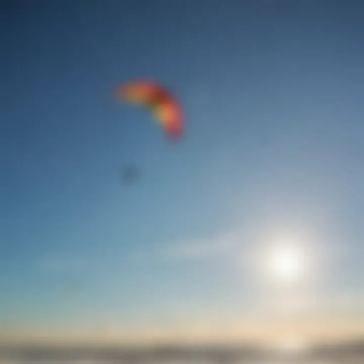 A vibrant kite flying high against a clear blue sky