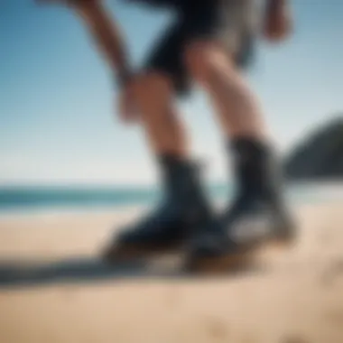 A rider adjusting kiteboard boots before a session, emphasizing safety and fit.