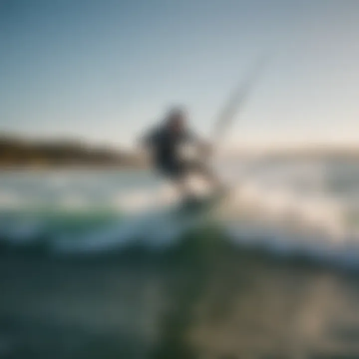 Aerial view of kiteboarder carving through crystal-clear waters