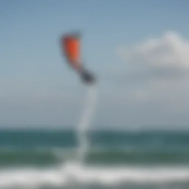 Kiteboarder executing a perfect jump with the kite in the background