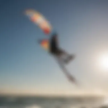 Silhouette of a kiteboarder maneuvering with a pigtail kite