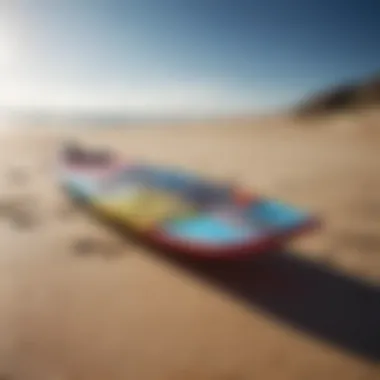 Vibrant kiteboarding gear on a sandy beach