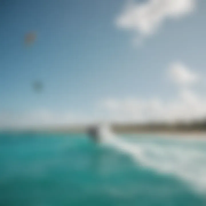 Kiteboarder expertly navigating the turquoise waters of Aruba with a backdrop of stunning beaches.