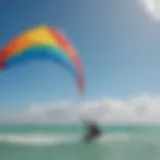 A vibrant kiteboarding scene showcasing colorful kites against the azure sky