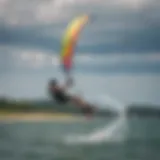 A vibrant kiteboarding scene at Lake Michigan with colorful kites soaring above the water.