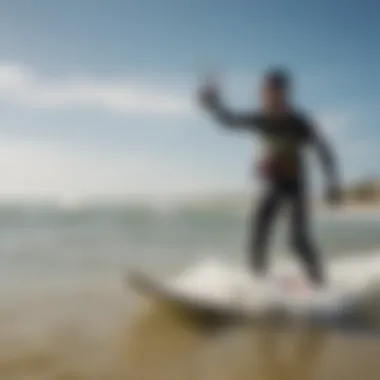 Kiteboarding instructor guiding a pupil in the basics on a calm beach