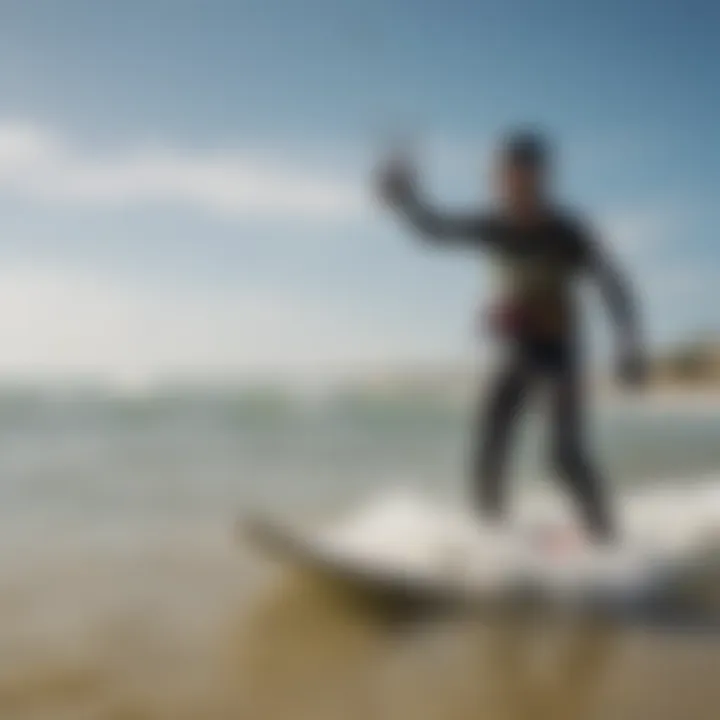 Kiteboarding instructor guiding a pupil in the basics on a calm beach