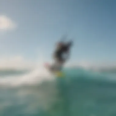 Kiteboarder performing advanced aerial maneuver on turquoise waves