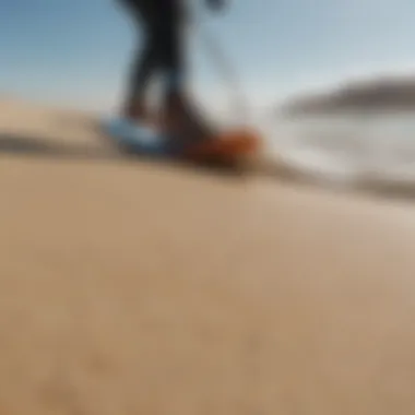 Kiteboarding lines coiled on sandy beach