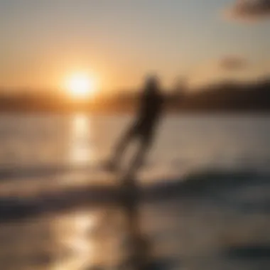 Sunset silhouette of kiteboarding with single-wheel pint