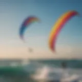 Colorful kites soaring over the ocean