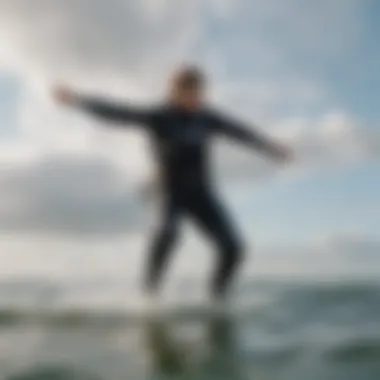 Kitesurfer performing a trick with ease in a drysuit