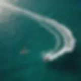 Aerial view of kitesurfing on crystal clear waters