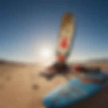 Kitesurfing gear essentials laid out on the sandy beach with clear blue skies