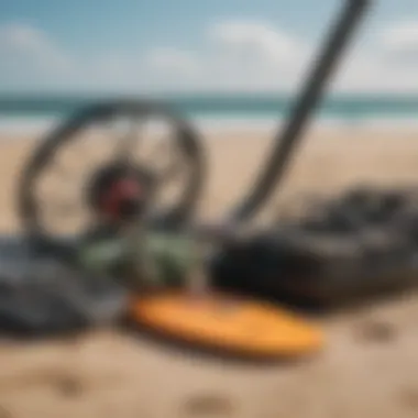 Kitesurfing gear essentials laid out on sandy beach