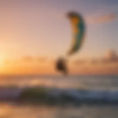 A skilled kitesurfer performing tricks against a stunning sunset backdrop