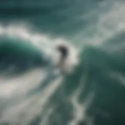 Aerial view of kitesurfing board cutting through waves