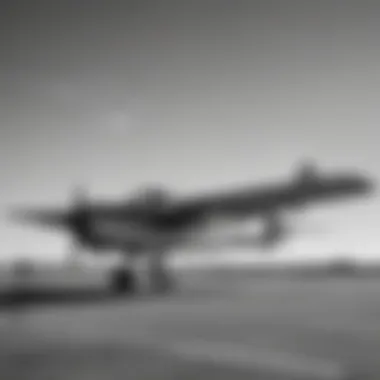 Vintage black and white photo of the first aircraft at Montauk Airport