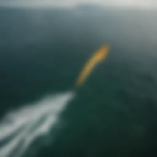 Aerial view of a solitary kitesurfer conquering the vast northern waters