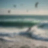 Aerial view of kitesurfers riding the waves