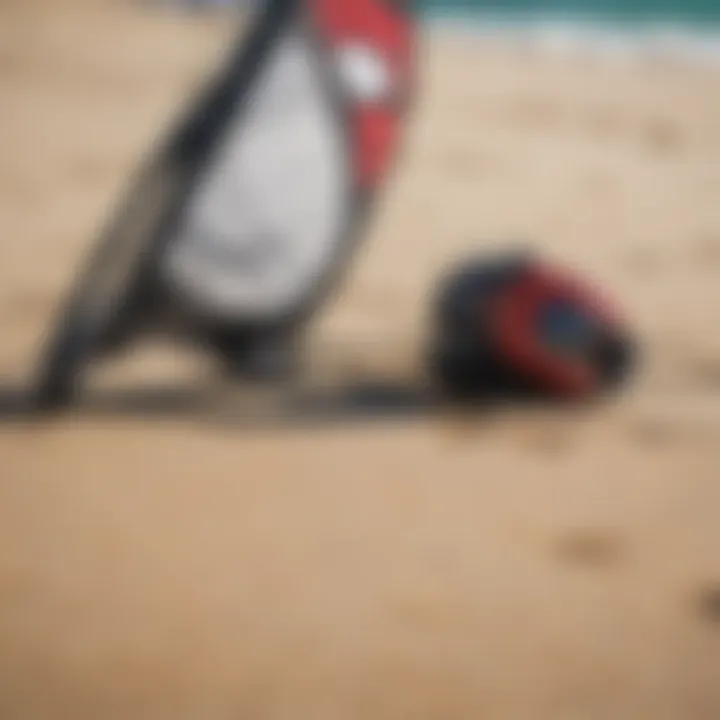 Close-up of high-quality kite surfing gear on a sandy beach