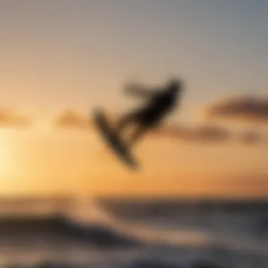 Silhouette of kiteboarder against the setting sun, showcasing the artistry of the sport