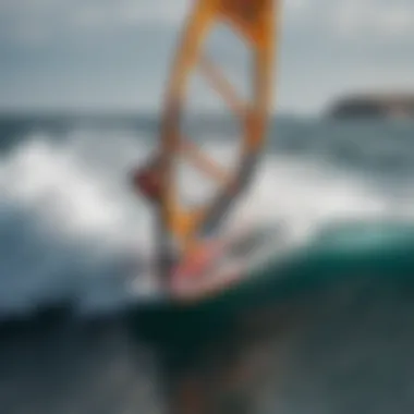 Close-up of hydrofoil windsurfing foil cutting through waves