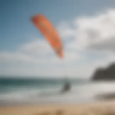 Scenic beach setting with Cabrinha Switchblade kite flying