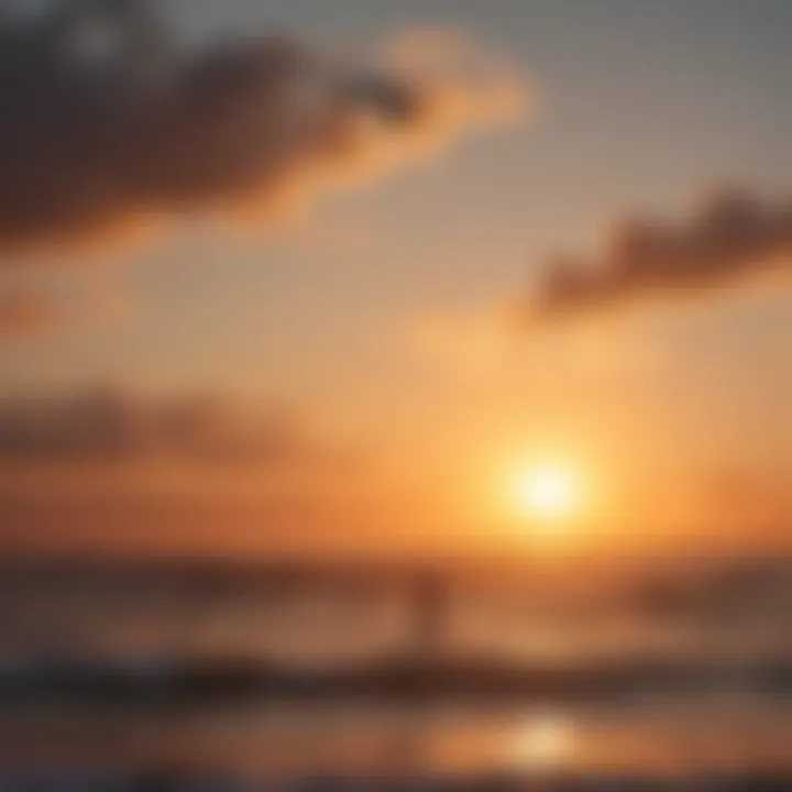 Silhouette of a kitesurfer against a picturesque sunset sky