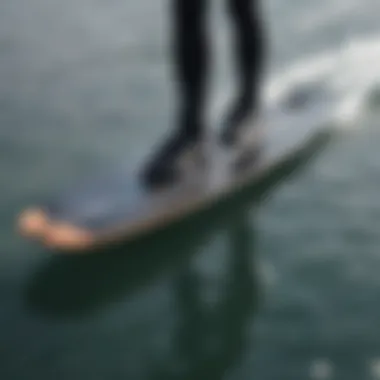 A close-up of the sleek design of an electric foil hydrofoil board