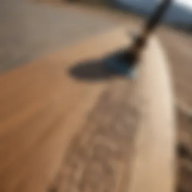 Close-up of specialized mountainboard deck with intricate grip design