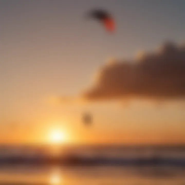 Sunset silhouette of kiteboarder against the ocean